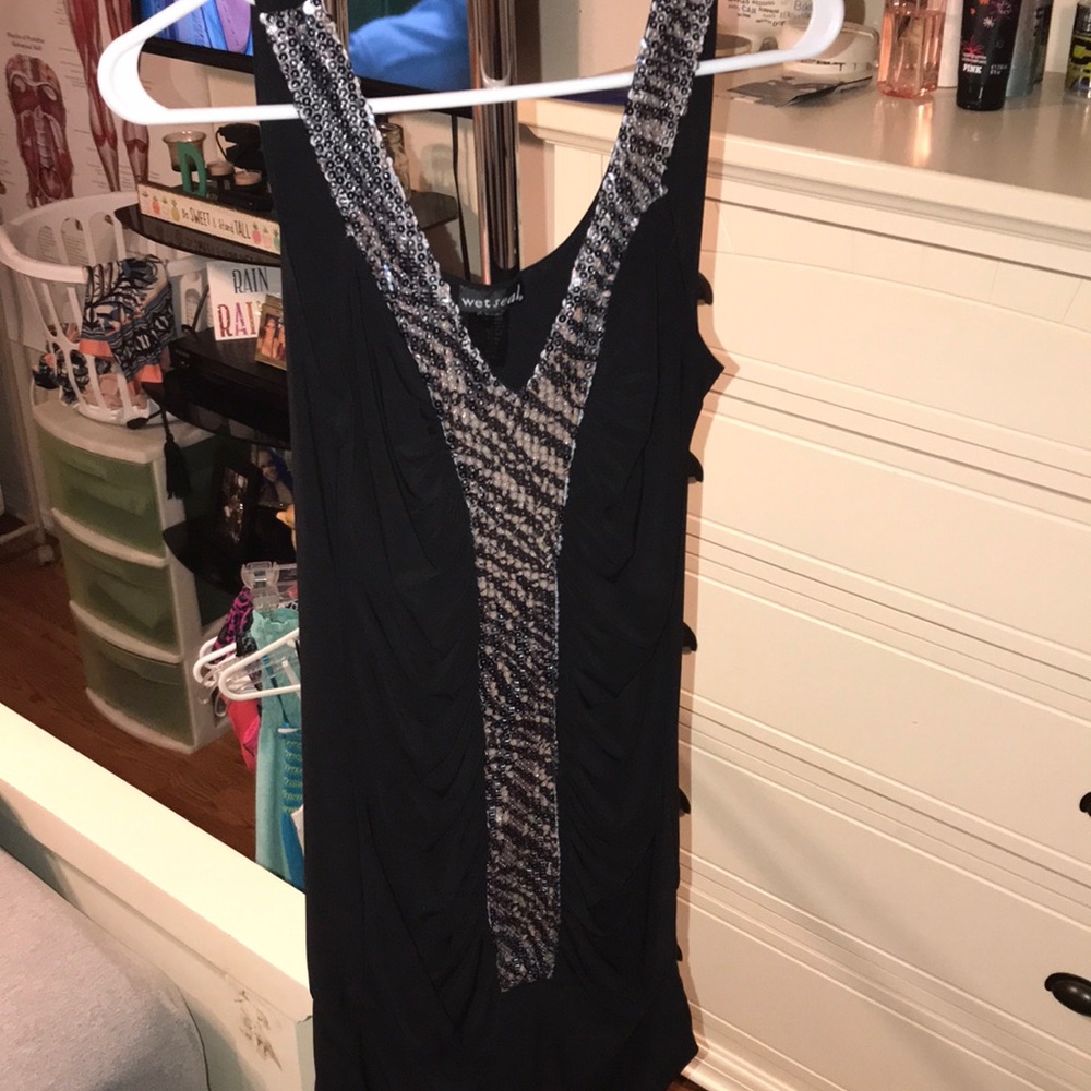 Fitted black dress with sparkles